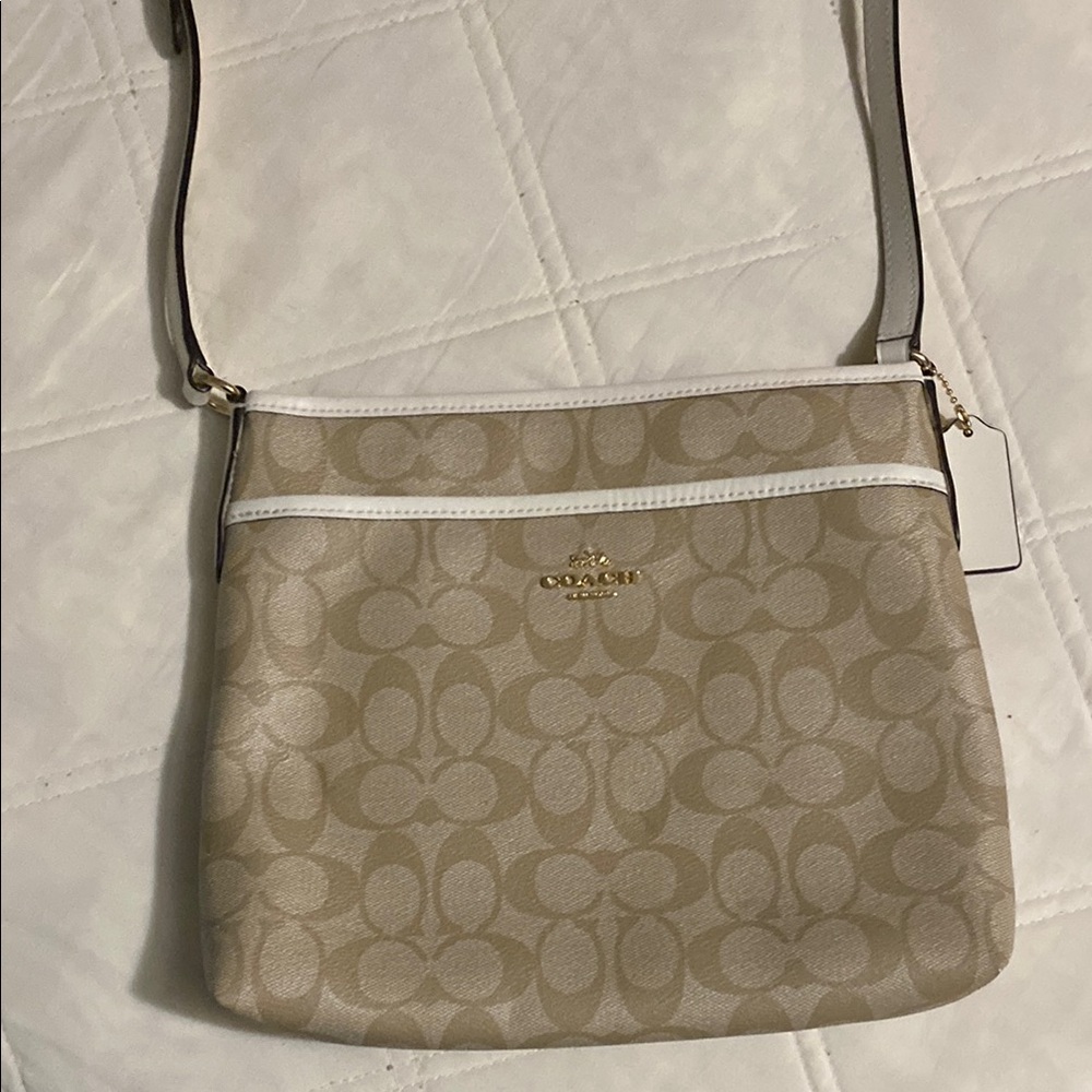 Coach Tan and White Crossbody Bag with Adjustable Strap and Zippered Closure